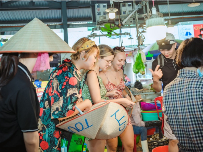 Traditional markets bustle in the morning with fresh seafood and local specialties